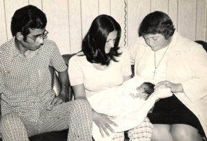 Sr. Angela with newborn and parents at Su Clinica Familias Birth Center